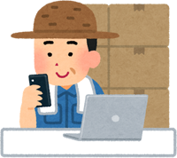 パソコンとスマホでやりとりする自営業の方